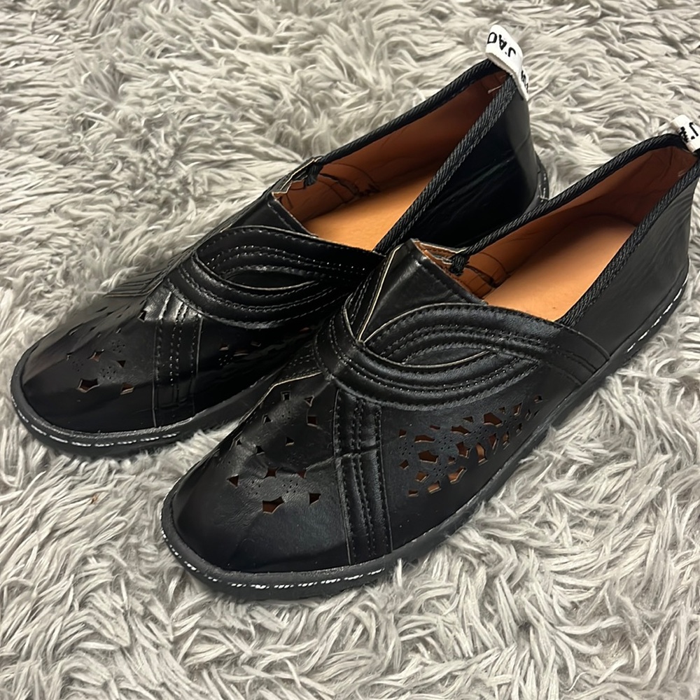 Black cut-out loafers